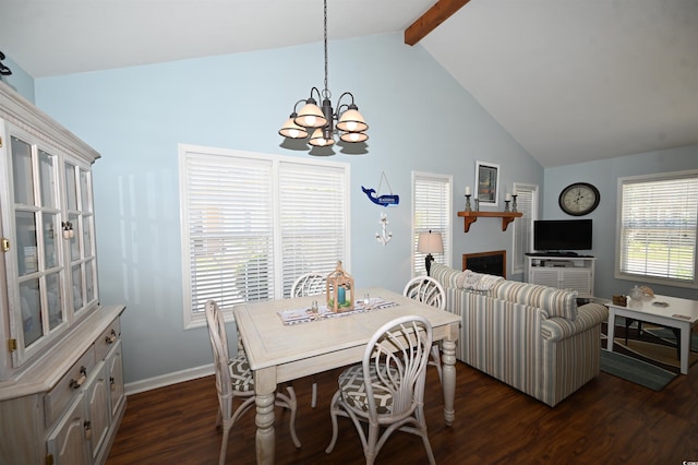 950 Tiffany Ln, North Myrtle Beach, SC 29582 - dining area featuring a chandelier, dark wood-style flooring, beamed ceiling, a fireplace, and high vaulted ceiling