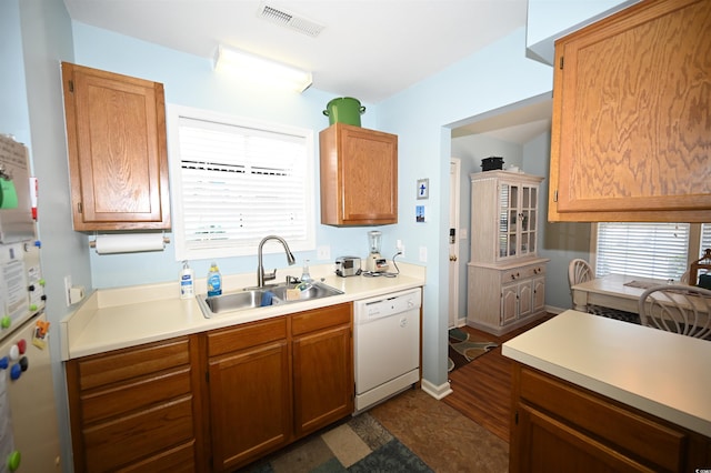 950 Tiffany Ln, North Myrtle Beach, SC 29582 - kitchen featuring dishwasher, light countertops, and plenty of natural light