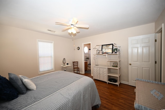 950 Tiffany Ln, North Myrtle Beach, SC 29582 - bedroom with dark wood-style floors and ceiling fan