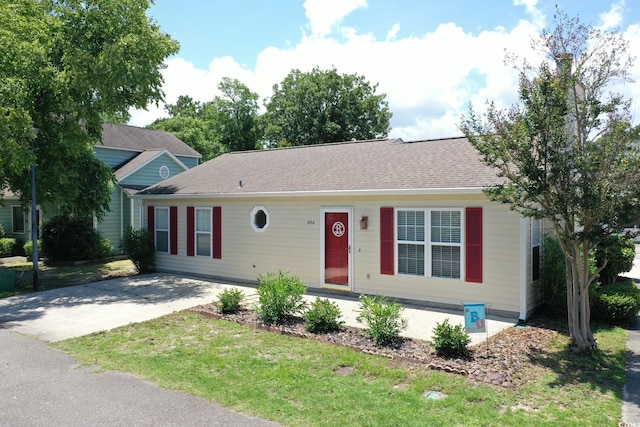 950 Tiffany Ln, North Myrtle Beach, SC 29582 - view of front of house featuring a front lawn and roof with shingles
