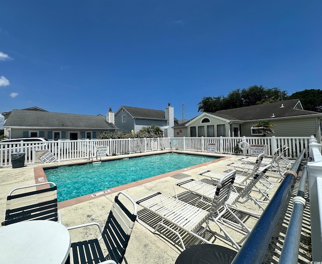 950 Tiffany Ln, North Myrtle Beach, SC 29582 - community pool with a patio