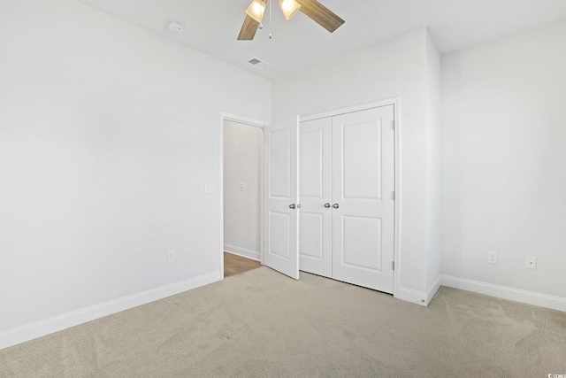 865 Summer Starling Pl, Myrtle Beach, SC 29577 - unfurnished bedroom featuring carpet, a closet, and ceiling fan
