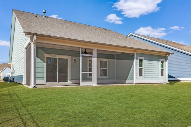 865 Summer Starling Pl, Myrtle Beach, SC 29577 - back of property featuring a lawn, a shingled roof, and a sunroom