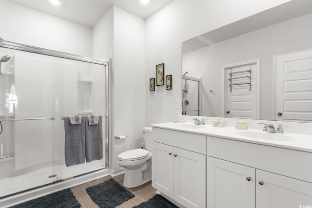1029 Saltgrass Way, Myrtle Beach, SC 29588 - full bath featuring a shower stall, double vanity, wood finished floors, and recessed lighting