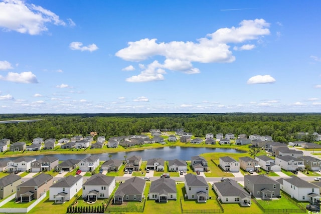 1029 Saltgrass Way, Myrtle Beach, SC 29588 - aerial perspective of suburban area featuring a heavily wooded area and a nearby body of water