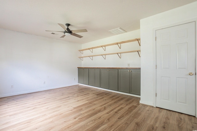 1897 Mossberg Dr, Sumter, SC 29150 - empty room with light wood finished floors and a ceiling fan