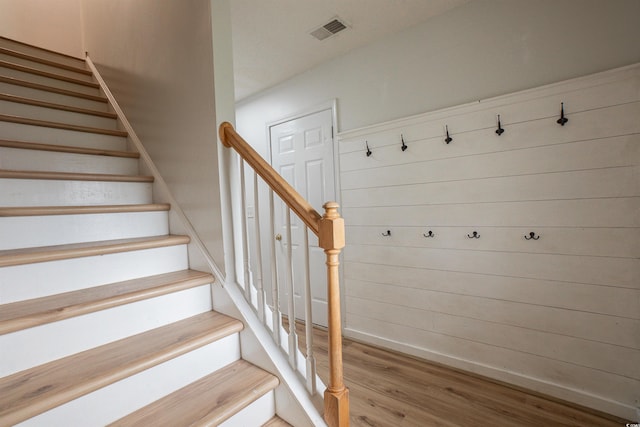 1897 Mossberg Dr, Sumter, SC 29150 - staircase featuring wood finished floors and baseboards