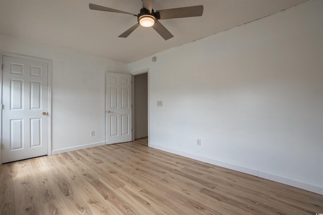 1897 Mossberg Dr, Sumter, SC 29150 - unfurnished bedroom with light wood-style floors and a ceiling fan