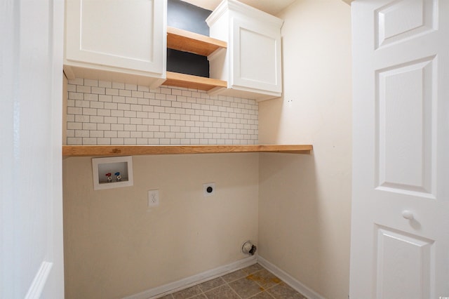 1897 Mossberg Dr, Sumter, SC 29150 - laundry area with hookup for an electric dryer, hookup for a washing machine, and cabinet space