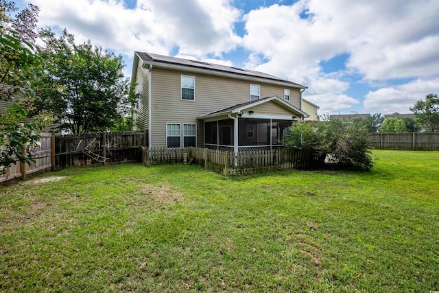 1897 Mossberg Dr, Sumter, SC 29150 - rear view of property featuring a fenced backyard and a sunroom