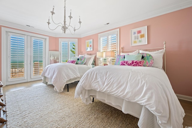 100 Ocean Park Loop, Georgetown, SC 29440 - bedroom with access to outside, a chandelier, and ornamental molding