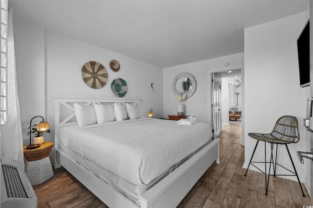 2001 S Ocean Blvd Unit 1405, Myrtle Beach, SC 29577 - bedroom with wood finished floors