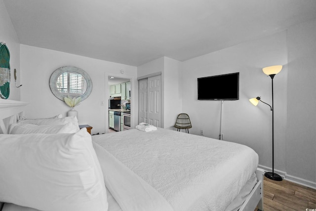 2001 S Ocean Blvd Unit 1405, Myrtle Beach, SC 29577 - bedroom with wood finished floors and a closet