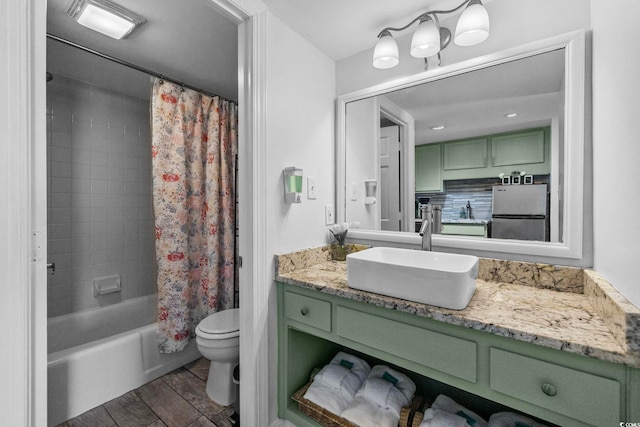 2001 S Ocean Blvd Unit 1405, Myrtle Beach, SC 29577 - bathroom with vanity, shower / bath combination with curtain, and wood finished floors