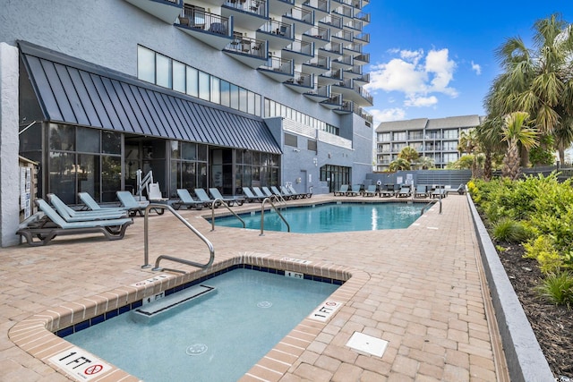 2001 S Ocean Blvd Unit 1405, Myrtle Beach, SC 29577 - community pool featuring a patio