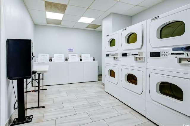 2001 S Ocean Blvd Unit 1405, Myrtle Beach, SC 29577 - community laundry with stacked washer / dryer and washing machine and clothes dryer