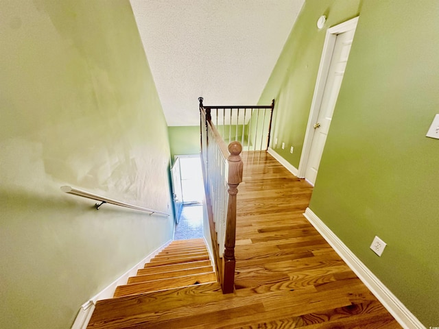 3978 Tybre Downs Cir Unit 3978, Little River, SC 29566 - stairway featuring baseboards and wood finished floors