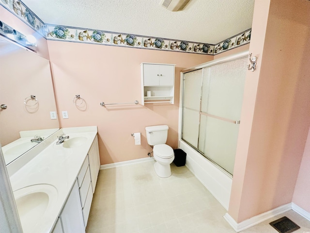 3978 Tybre Downs Cir Unit 3978, Little River, SC 29566 - bathroom with double vanity, a textured ceiling, and enclosed tub / shower combo