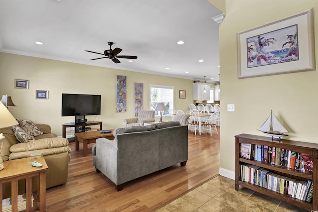 421 30th Ave S, Sunset Beach, NC 28468 - living room with a ceiling fan, ornamental molding, light wood-style flooring, and recessed lighting