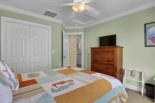 421 30th Ave S, Sunset Beach, NC 28468 - bedroom featuring attic access, a closet, ornamental molding, carpet floors, and a ceiling fan