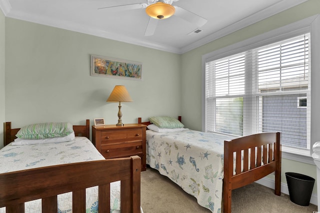 421 30th Ave S, Sunset Beach, NC 28468 - bedroom featuring ornamental molding, carpet, and ceiling fan
