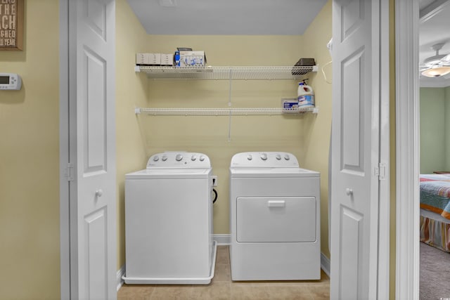 421 30th Ave S, Sunset Beach, NC 28468 - washroom featuring washing machine and clothes dryer and light tile patterned floors