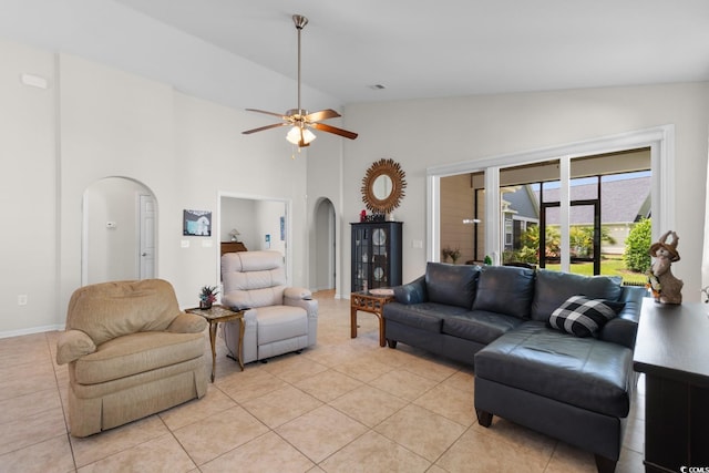 637 Grand Cypress Way, Murrells Inlet, SC 29576 - living room featuring arched walkways, light tile patterned floors, a ceiling fan, and high vaulted ceiling