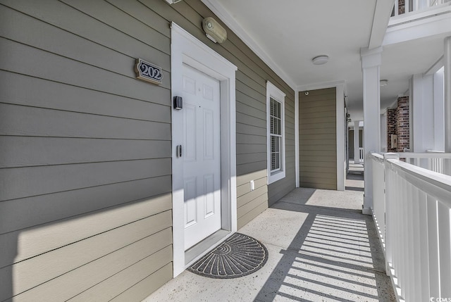 4821 Luster Leaf Cir Unit 202, Myrtle Beach, SC 29577 - entrance to property with a porch