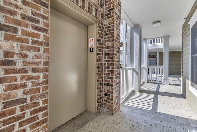 4821 Luster Leaf Cir Unit 202, Myrtle Beach, SC 29577 - property entrance with brick siding and elevator