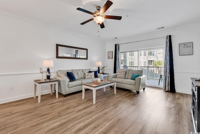 4821 Luster Leaf Cir Unit 202, Myrtle Beach, SC 29577 - living area with crown molding, ceiling fan, and light wood finished floors