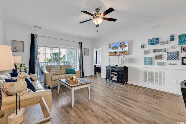 4821 Luster Leaf Cir Unit 202, Myrtle Beach, SC 29577 - living area with ceiling fan, crown molding, and light wood finished floors