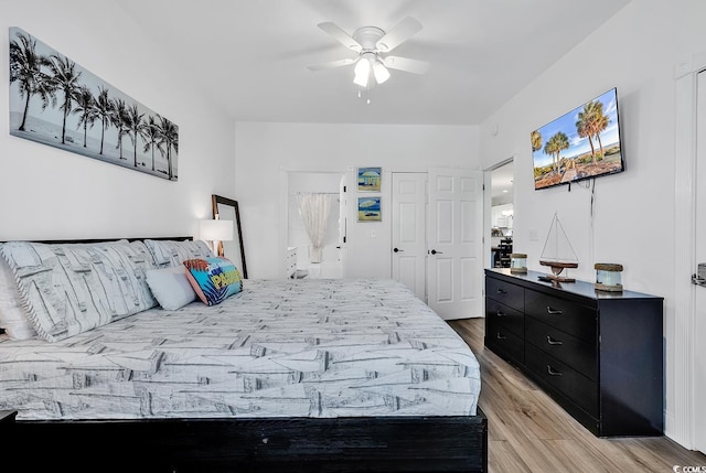 4821 Luster Leaf Cir Unit 202, Myrtle Beach, SC 29577 - bedroom featuring light wood-type flooring and ceiling fan