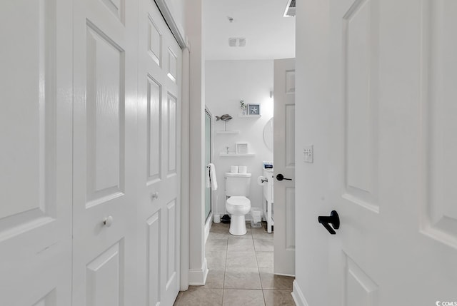4821 Luster Leaf Cir Unit 202, Myrtle Beach, SC 29577 - bathroom featuring toilet and tile patterned floors