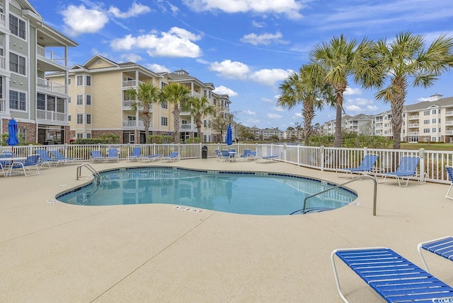 4821 Luster Leaf Cir Unit 202, Myrtle Beach, SC 29577 - community pool with a patio area