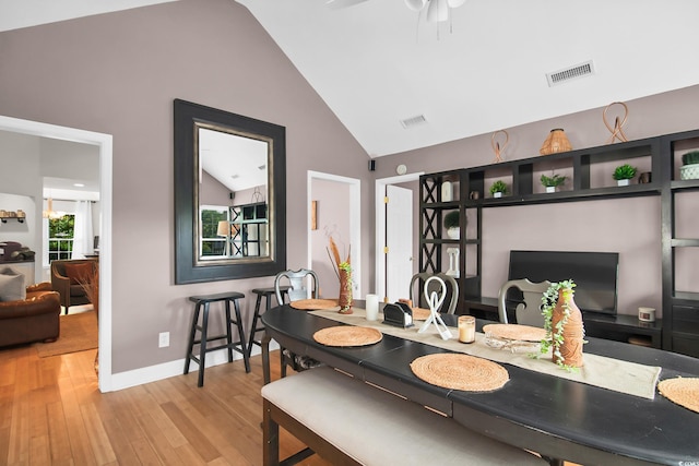 174 Edward Ave, Murrells Inlet, SC 29576 - dining room with wood finished floors, a ceiling fan, and high vaulted ceiling
