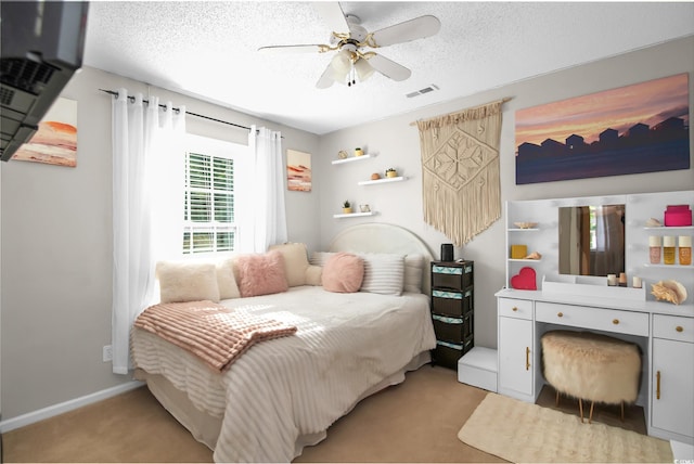174 Edward Ave, Murrells Inlet, SC 29576 - bedroom featuring light carpet, a textured ceiling, and a ceiling fan