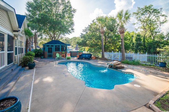 174 Edward Ave, Murrells Inlet, SC 29576 - view of swimming pool with a patio area, an outbuilding, and view of scattered trees