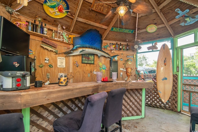 174 Edward Ave, Murrells Inlet, SC 29576 - kitchen with ceiling fan, unfinished concrete floors, and vaulted ceiling