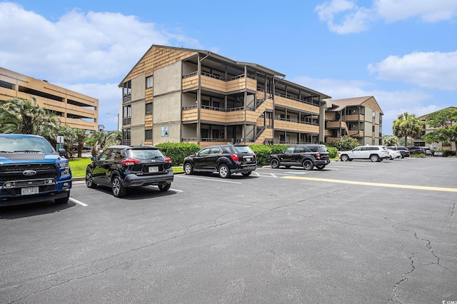 9501 Shore Dr Unit 135, Myrtle Beach, SC 29572 - view of apartment building / complex with uncovered parking