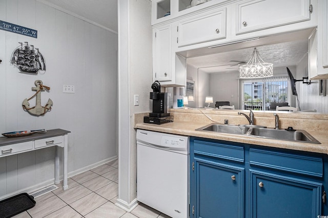 9501 Shore Dr Unit 135, Myrtle Beach, SC 29572 - kitchen featuring blue cabinetry, dishwasher, white cabinetry, and light countertops