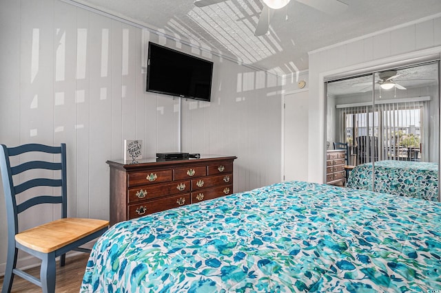 9501 Shore Dr Unit 135, Myrtle Beach, SC 29572 - bedroom featuring wood finished floors, a ceiling fan, and vaulted ceiling