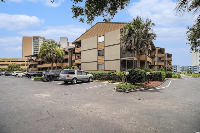 9501 Shore Dr Unit 135, Myrtle Beach, SC 29572 - view of apartment building / complex featuring uncovered parking