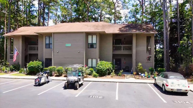 1102 Indian Wells Ct # 2, Garden City Beach, SC 29576 - view of property featuring uncovered parking