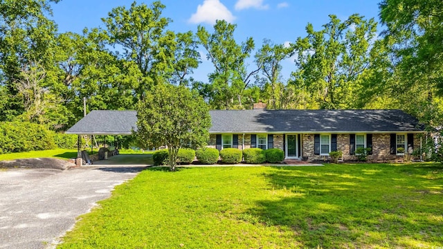 1032 Chelsey Cir, Conway, SC 29526 - single story home featuring a front yard, driveway, a chimney, and brick siding