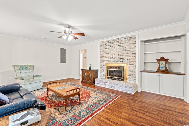 1032 Chelsey Cir, Conway, SC 29526 - living area with electric panel, wood finished floors, crown molding, ceiling fan, and a brick fireplace