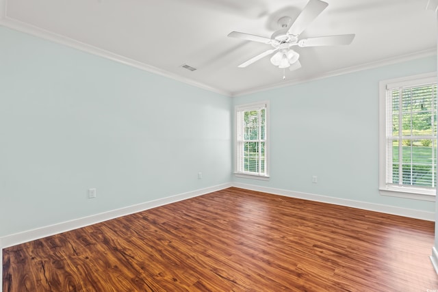 1032 Chelsey Cir, Conway, SC 29526 - unfurnished room with crown molding, plenty of natural light, dark wood finished floors, and a ceiling fan