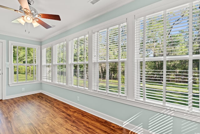 1032 Chelsey Cir, Conway, SC 29526 - unfurnished sunroom featuring healthy amount of natural light, wood finished floors, and crown molding