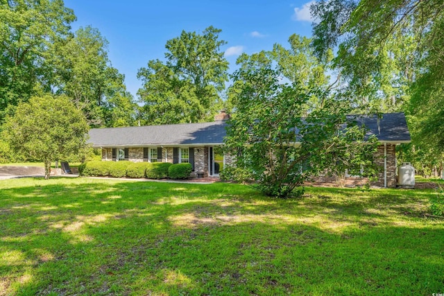 1032 Chelsey Cir, Conway, SC 29526 - ranch-style house featuring a front lawn, a chimney, and brick siding