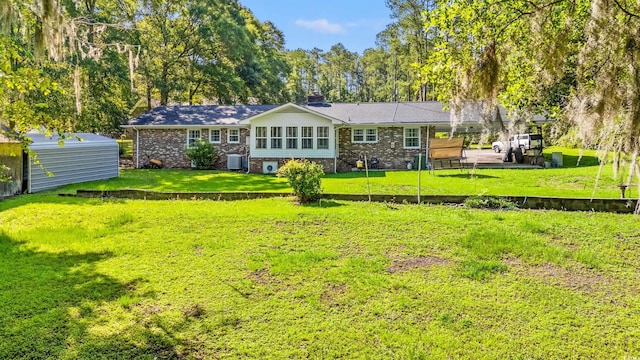 1032 Chelsey Cir, Conway, SC 29526 - back of house featuring a chimney, a yard, and an outbuilding