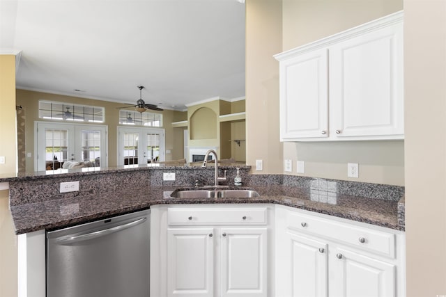 2210 Haystack Way, Myrtle Beach, SC 29579 - kitchen with stainless steel dishwasher, a ceiling fan, french doors, white cabinetry, and dark stone counters